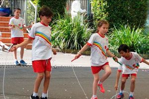 students skipping rope at school
